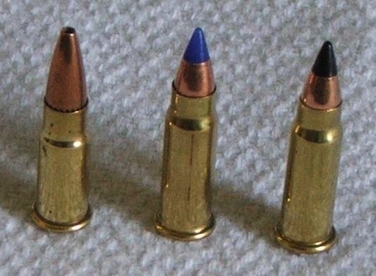 Figure 1 — Three .17 cartridges built on the .22 Long Rifle's head. Left, the .17 Aguila (also sold as the .17 PMC), a standard-length .22 LR case necked down; centre, an Eley-loaded .17 Mach 2 with a blue ti…