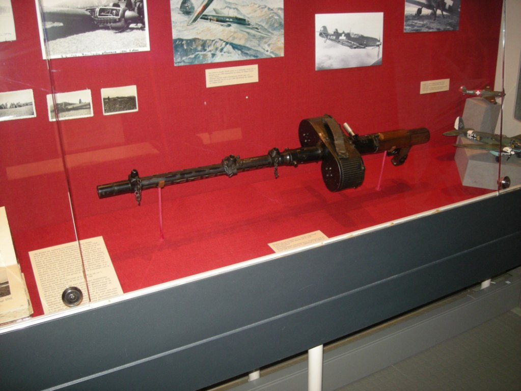 Figure 7.2 — Rheinmetall MG-15 (1930s German aircraft observer's machine gun), the first of the three flash-hider donor candidates. The muzzle hardware at the right (barrel jacket termination) has …