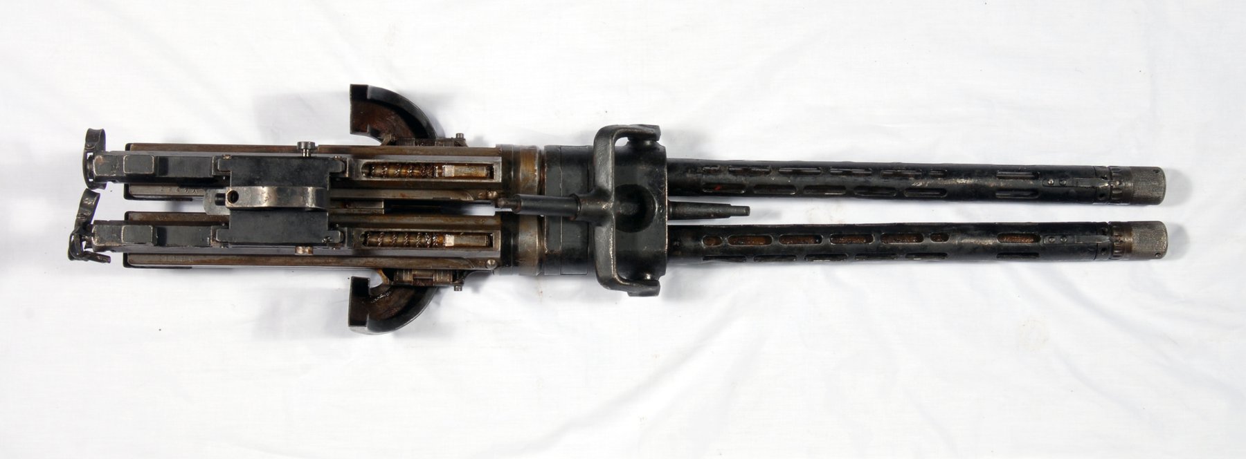Figure 7.3 — Mauser MG-81 aircraft machine gun in twin-mount configuration (1939-1945, the MG-15's faster-firing successor). The MG-81 was a dual-barrel aircraft observer's weapon; visually the muz…