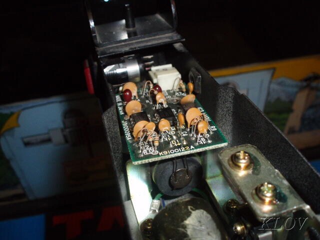 Figure 3 — The inside of an Operation Wolf gun with its cover off, from a collector's photograph: the sensor board with its capacitors in the barrel, and part of the mechanism below it. Photo: KLOV / Internat…