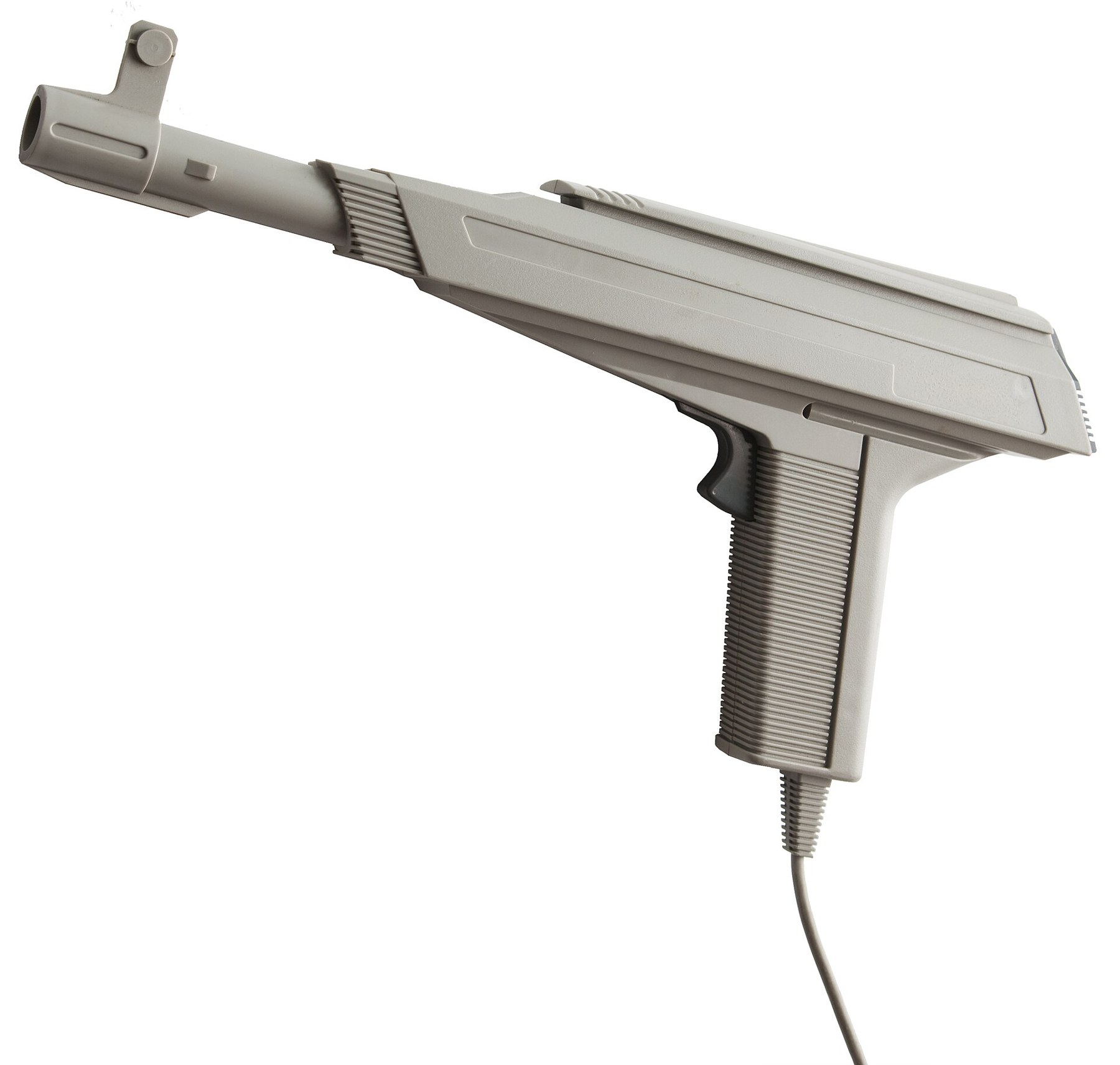 Figure 10 — The Atari XG-1, a grey pistol with a long ribbed barrel, sold with the Atari XE Game System and compatible with the 7800 and 2600. Photo: Bilby, Wikimedia Commons, CC BY 3.0.