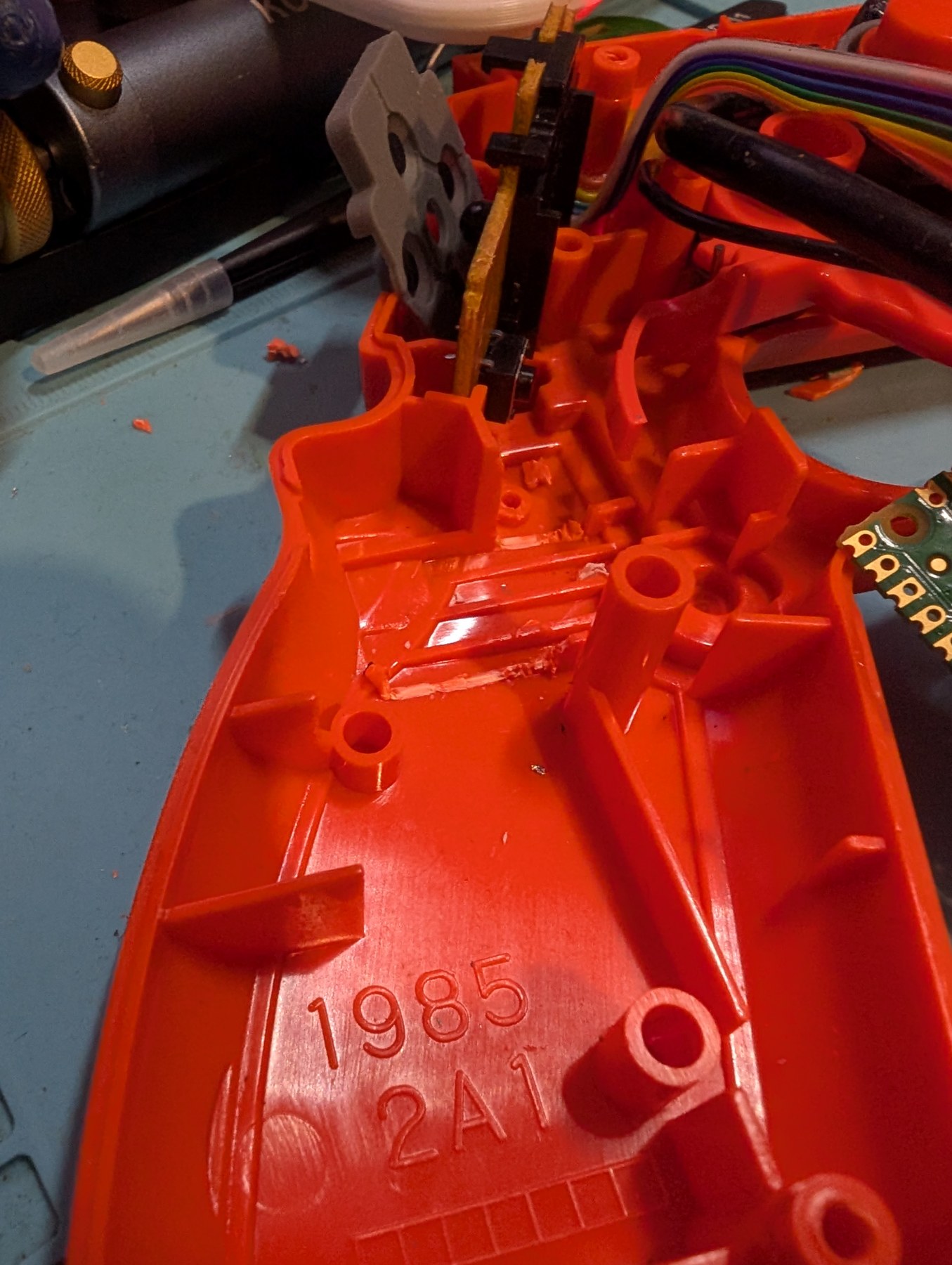 Figure 4 — The GunCon 2 grip with the two plastic tabs cut away to take a Pico-footprint board. Photo: The Opponent, 28 July 2025, CC0.