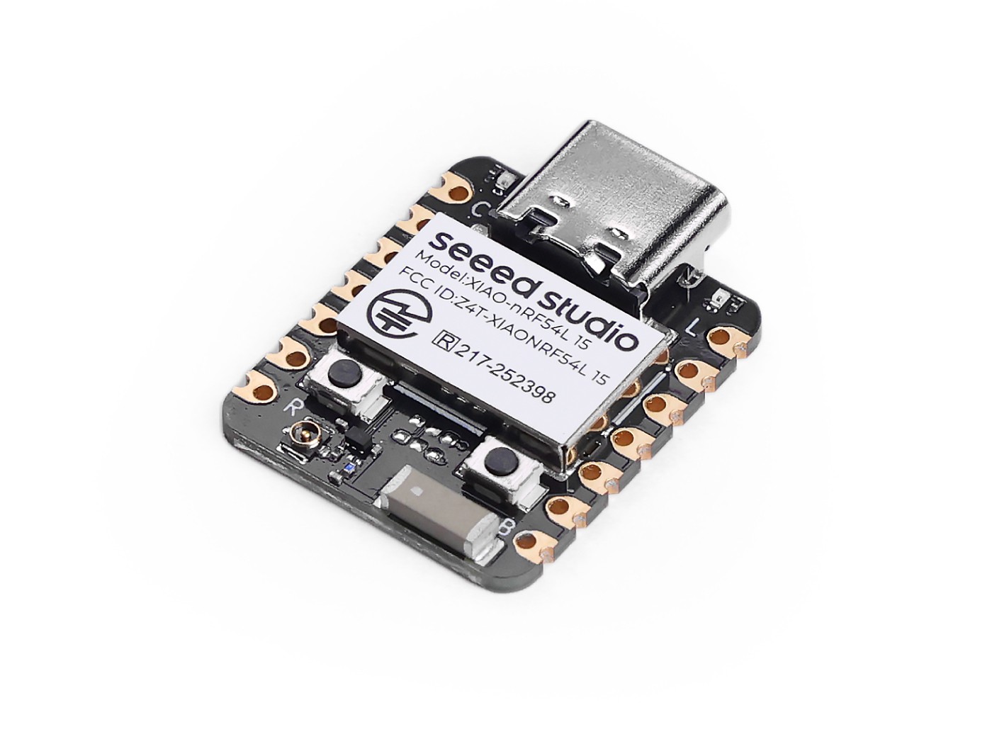 Figure 3 — The Seeed Studio XIAO nRF54L15: a thumb-sized module with a USB-C socket, two buttons, a U.FL antenna socket beside the ceramic antenna, castellated edge pads, and a shield can printed with its mod…