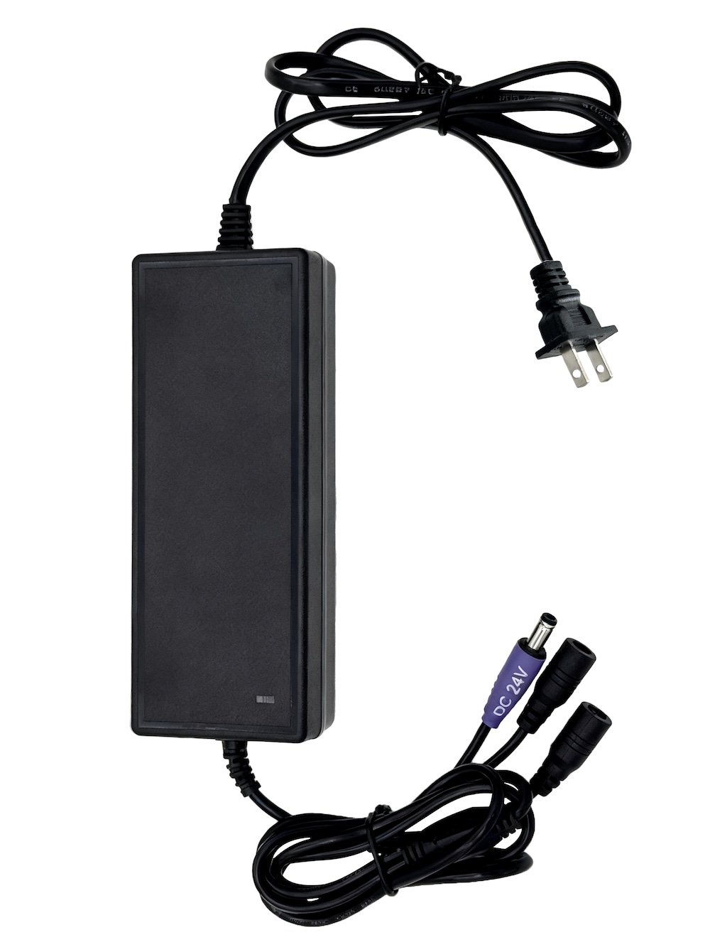Figure 9 — The 24 V adapter RetroShooter ships with its two-gun set: one brick, one output cable split into two plugs, one per gun. Its current rating is not stated on the product page. Photo: RetroShooter.
