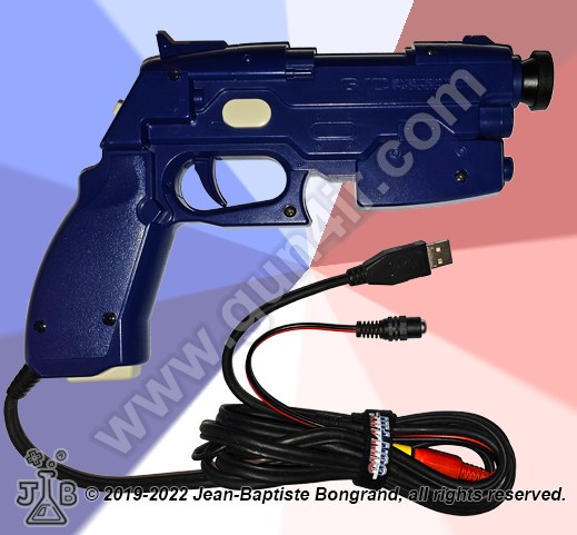 Figure 2 — GUN4IR's pre-modified GunCon 2, with the USB lead and the separate barrel-jack lead for the solenoid supply. A complete gun like this is a useful reference for what a kick should feel and sound lik…