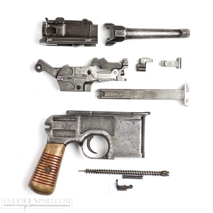 Figure 6.2 — A field-stripped C96 showing the major groups that un-interlock in sequence: barrel + barrel-extension, the square bolt, the lock sub-frame with hammer/sear/locking-block, and the maga…