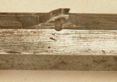 Figure 8 — The forward barrel lug of the Beeman rifle, torn open and tapped back into place, which Beeman attributes to the same impact. Photograph by Robert D. Beeman, 2005, from beemans.net via the Internet…