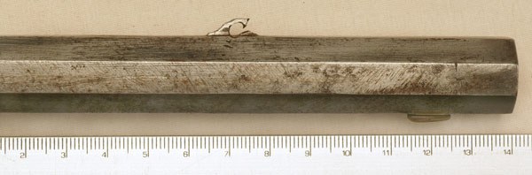 Figure 9 — Rough cross-filing near the front sight of the Beeman rifle, cutting across the original lengthwise draw-filing of the barrel flats, which Beeman interprets as field repair of impact damage, perhap…