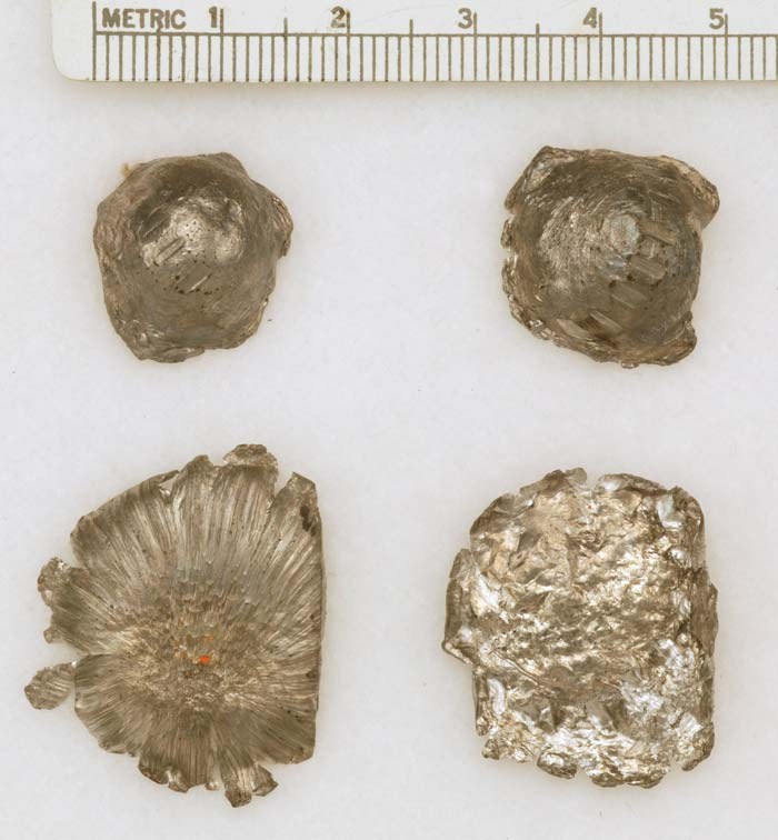 Figure 3 — Lead balls of 0.464 in (11¾ mm): unfired, and fired from Ernest Cowan's reproduction of the Beeman rifle into soft material and against a steel plate, the last flattened to about 30 mm. Photograph …