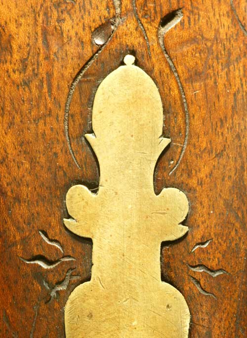 Figure 11 — Carved lines on the underside of the Beeman rifle's forend, which Cowan and Keller interpret as "lightning bolts" carved during the expedition. No comparable carving is known on another Girardoni. …