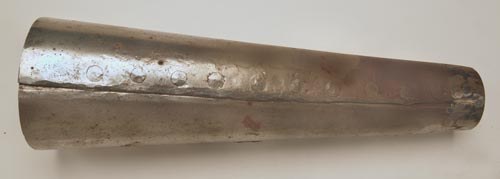 Figure 3 — The flask for one of Ernest Cowan's museum copies of the Beeman rifle, its seam riveted before brazing. Cowan found his first dozen or so flasks cracked when brazed, until he followed old gunsmith …