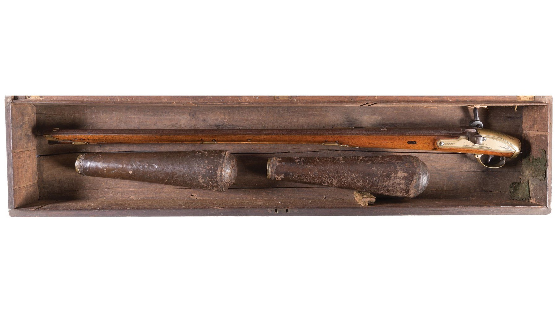 Figure 7 — A cased Girandoni-system repeating air rifle by Mortimer & Son of London, made before 1818, with a second flask; the case label reads "Mortimer & Son, Gun Makers to His Royal Highness the Prince Re…