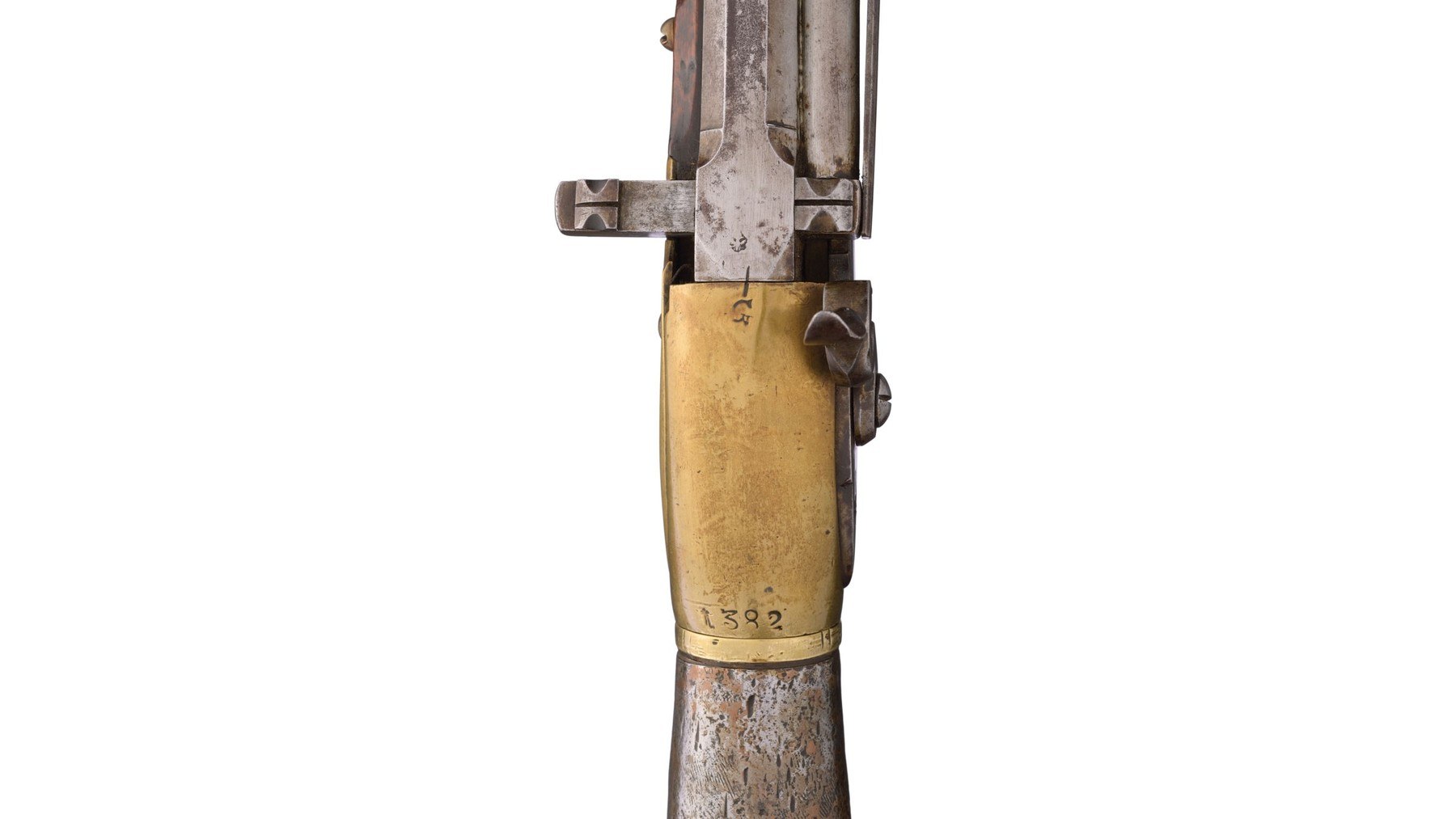 Figure 1 — The top of the breech of an Austrian military Girardoni (Rock Island Auction lot 272), seen from behind with the muzzle away from the camera. The loading bar runs across the breech, its ridged butt…