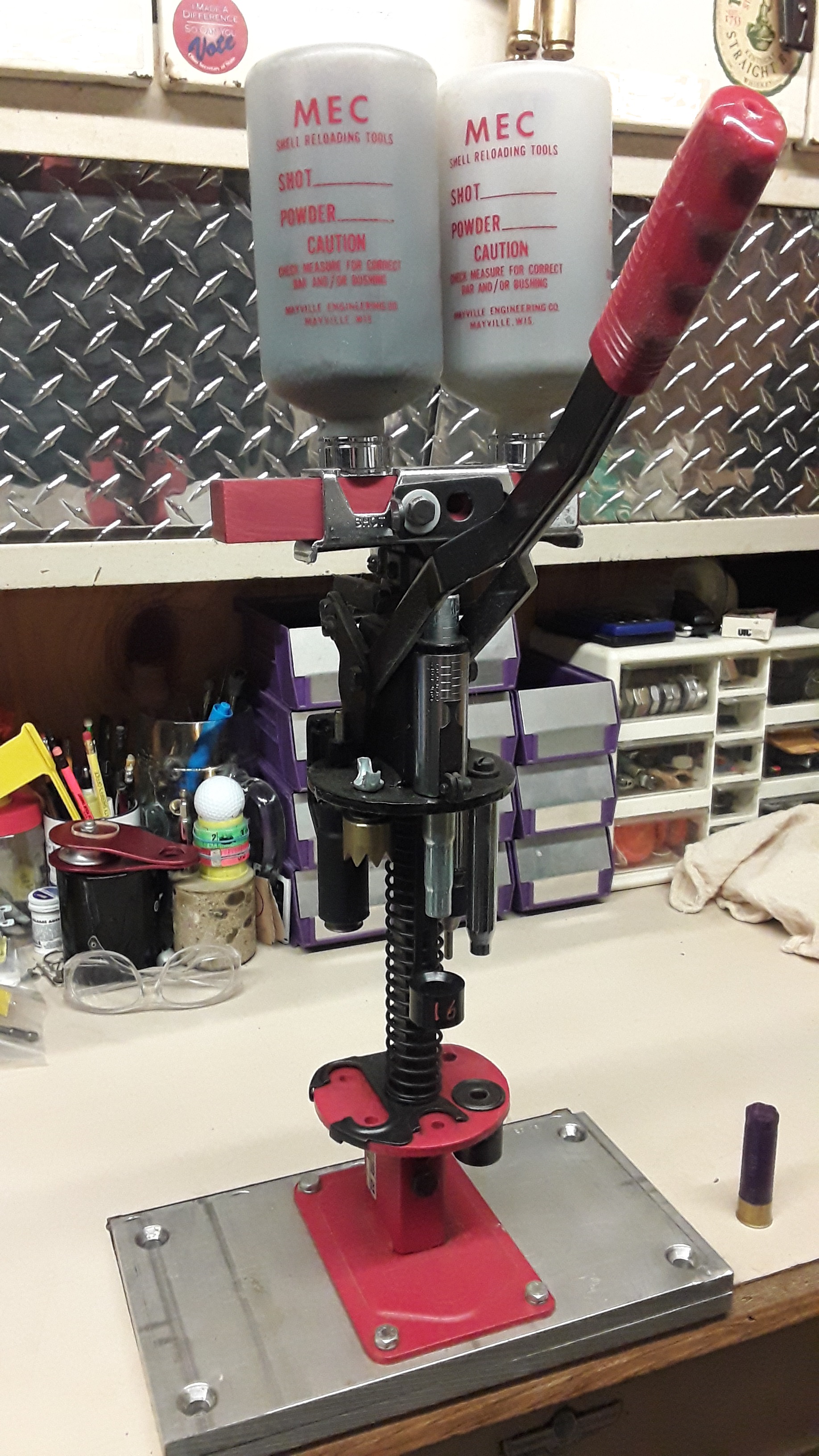 Figure 6 — A single-stage shotshell press. The application differs but the architecture is the one the turret argument is measured against: one die, threaded into the frame, doing one operation to one case at…